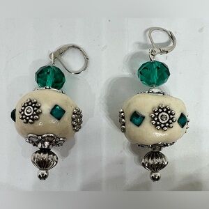 Silver Tone Lampwork Cream Lever Back Earrings with Green Faceted Bead Accents